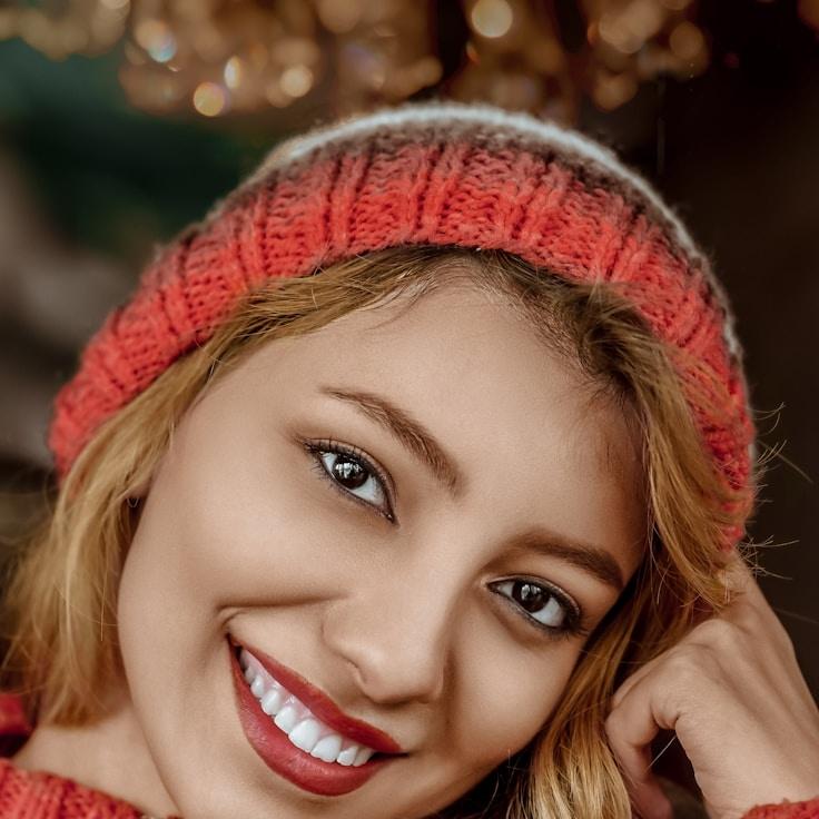 Kaveri Mehta, Lead Design Curator at Harbor Glade Atlas, reviewing corporate floral arrangements